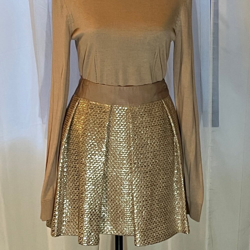 Milly blush mini skirt with metallic thread, size 12. Never worn, tags intact.